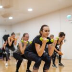 “일상 속에서 지키는 내 뇌 건강, 새로운 트렌드와 실천법” A group of women doing exercises with dumbbells