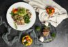 건강한 식탁, 똑똑한 영양제 선택이 중요해져 a white plate topped with meat and veggies